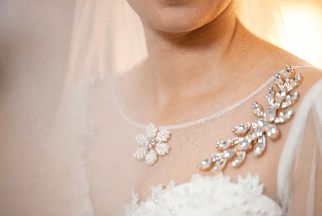 A stunning collection of brooch aesthetic jewelry featuring vintage gold cameos, modern crystal statement pieces, and pearl clusters artfully arranged on soft velvet. The display captures the timeless elegance and diversity of brooch design for ladies, from heirloom treasures to luxury designer brooches.